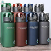 BPA-Free leak proof sports water bottles in green, brown, blue, and gray, durable and portable for hiking, gym, and travel