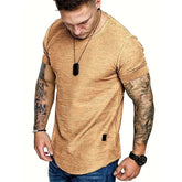Man wearing men's lightweight short sleeve t-shirt in tan color with textured fabric and casual fit
