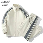 Men's 2 piece tracksuit with long sleeve full zip jacket and striped adjustable fit pants in light color