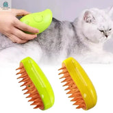 3-In-1 Steamy Cat and Dog Grooming Brush with soft bristles for massage, detangling, and cleaning on a gray and white cat