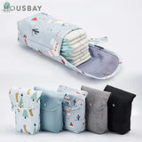 Reusable waterproof baby diaper bag organizer with zipper closure and unisex nylon design holding diapers and available in multiple colors