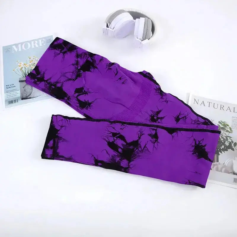 Upgrade your yoga wardrobe with our Women's Seamless Tie Dye Yoga Pants, designed for comfort and style. These ankle-length leggings feature a soft and stretchy span