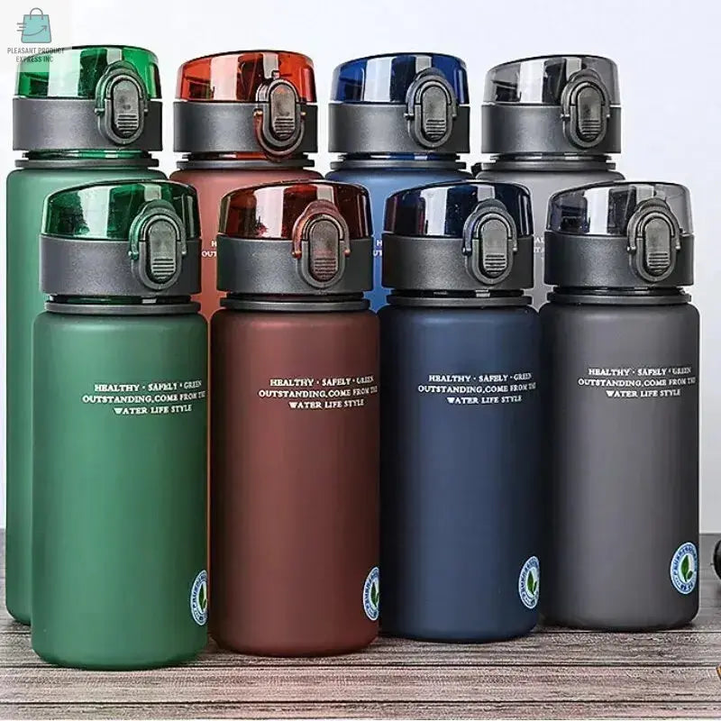 BPA-Free leak proof sports water bottles in green, brown, blue, and gray, durable and portable for hiking, gym, and travel