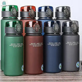 BPA-Free leak proof sports water bottles in green, brown, blue, and gray, durable and portable for hiking, gym, and travel